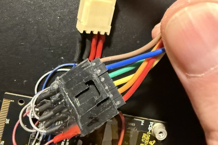 Because of multiple debricking attempts I had to wire a connector to avoid constand soldering and desoldering of the QSPI chip